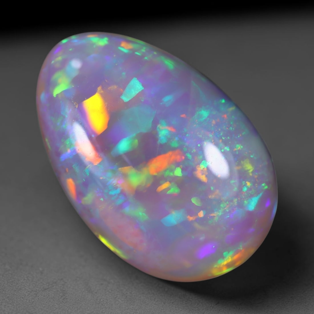 *14.20Ct Welo Opal Polished - Ethiopian Opal , 1112E: Ksmith Heritage Auctioneers Subject: Natural Ethiopian Welo Opal Origin: Ethiopia Carat Weight: 14.20Ct Dimension: 23x15.6x7.3 mm Treatment: Natural Untreated Type: Caboch