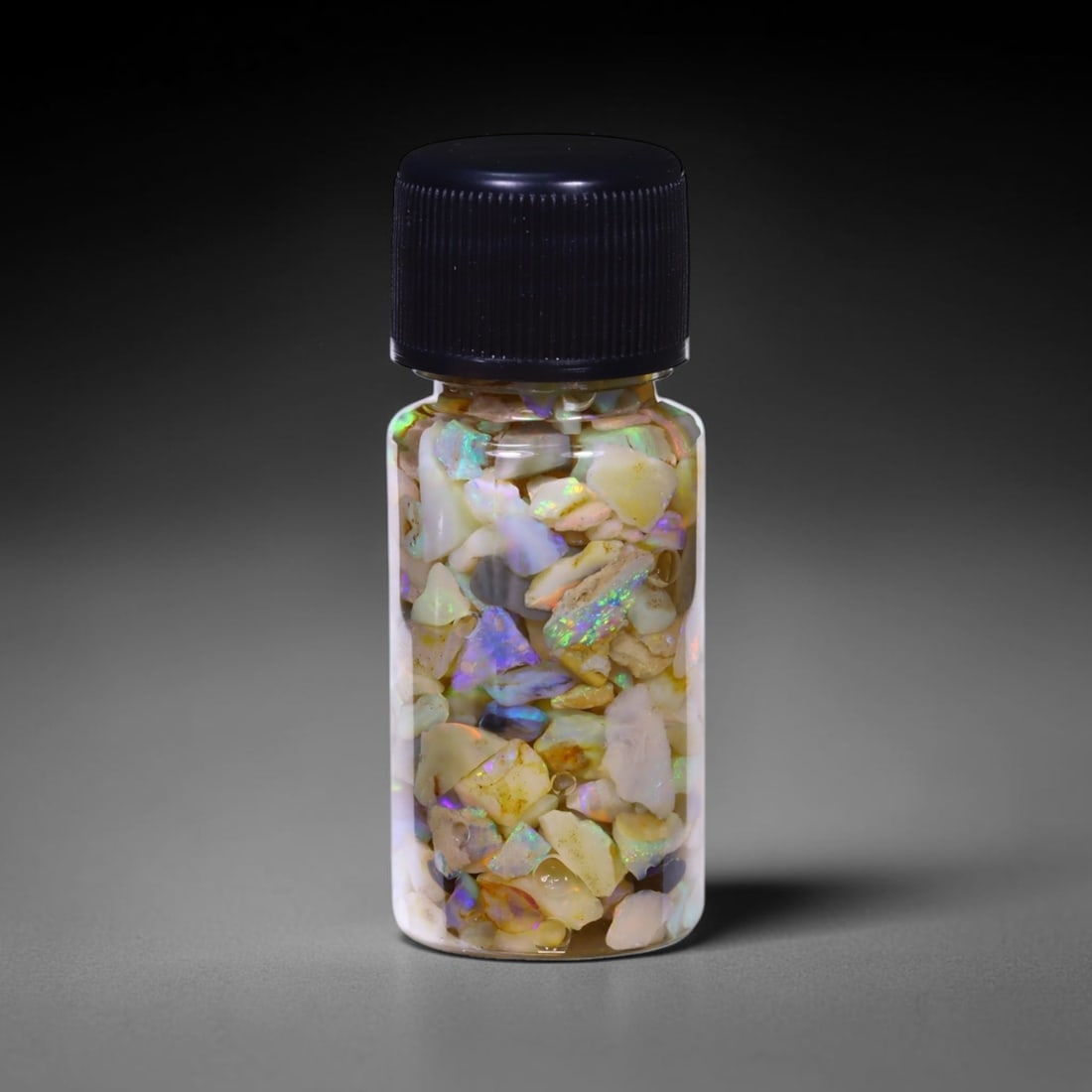 Australian Lightning Ridge Crystal Black Opal Rough Chip Jar (Good For Display), 643B: Ksmith Heritage Auctioneers Subject: Natural Australian Opal Origin: Australia Quantity: 1 Jar as photo