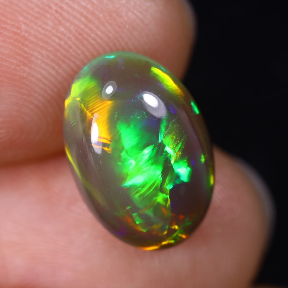 3.86Ct Natural Ethiopian Opal - 13.8x9.6x5.6 mm , 569C: Ksmith Heritage Auctioneers Subject: Natural Ethiopian Welo Opal Origin: Ethiopia Treatment: Unheated