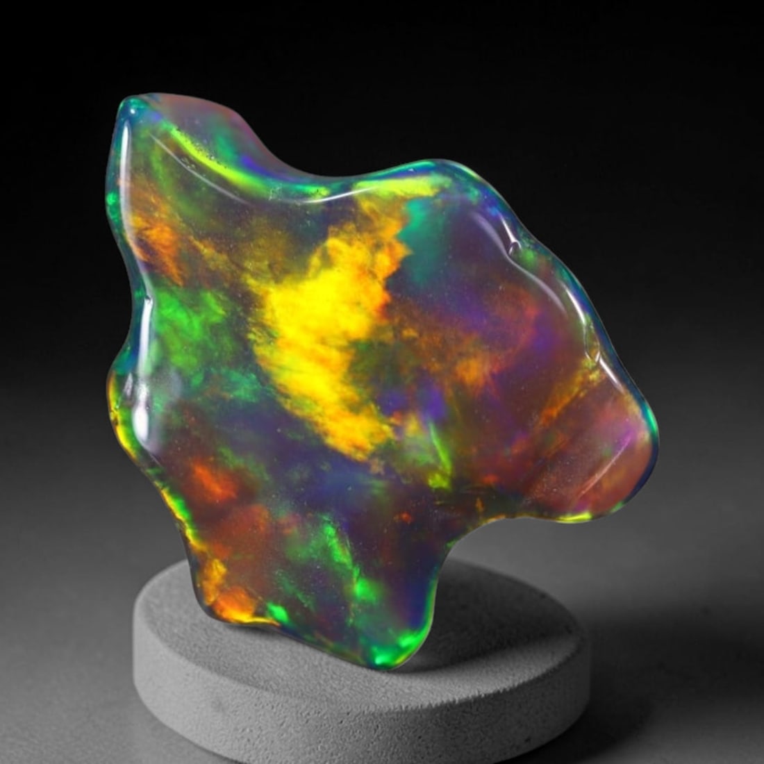 *1.56Ct Smoked Freeform Welo Opal Polished - Ethiopian Opal , 206C: Ksmith Heritage Auctioneers Subject: Natural Ethiopian Welo Opal Origin: Ethiopia Carat Weight: 1.56Ct Dimension: 12.7x10.2x3 mm Treatment: Smoked Type: Freeform, Polished