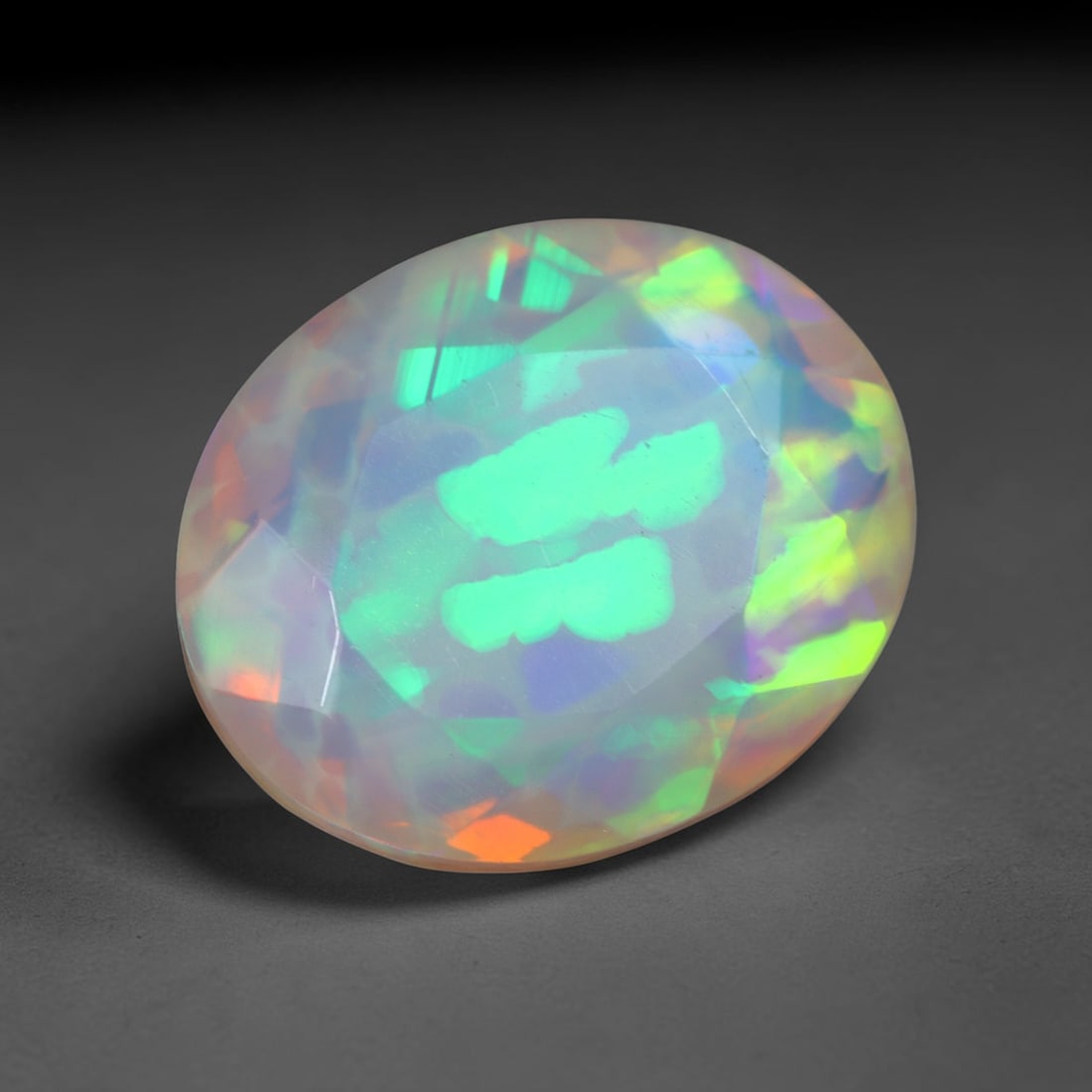 3.06Ct Natural Ethiopian Opal, Faceted Cut - 12.1x10.1x5.8 mm , 675C: Ksmith Heritage Auctioneers Subject: Natural Ethiopian Welo Opal Origin: Ethiopia Treatment: Unheated