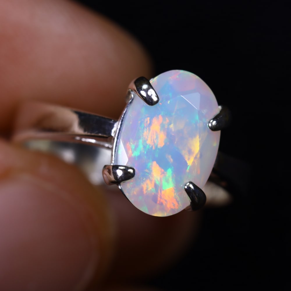 3.04g Natural Opal Stone Sterling Silver 925 Ring (Adjustable) , 979E: Ksmith Heritage Auctioneers Subject: Natural Ethiopian Opal Ring (Silver 925) Origin: Ethiopia Stone Dimension: 11x8mm Treatment: Natural Untreated Type: Faceted, Polished