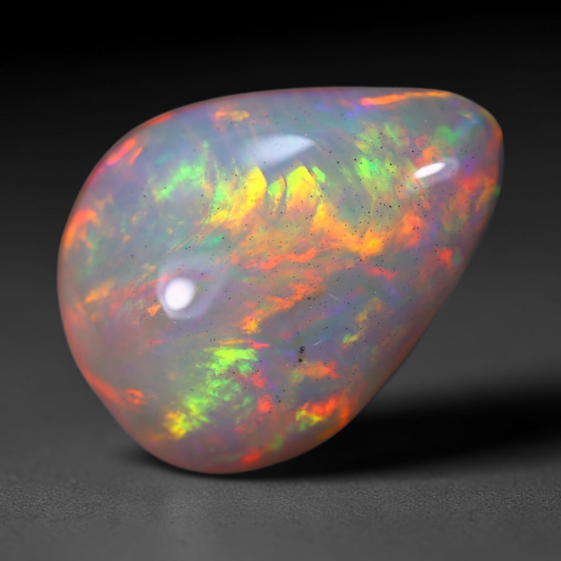 *6.27Ct Welo Opal Polished - Ethiopian Opal , 796E: Ksmith Heritage Auctioneers Subject: Natural Ethiopian Welo Opal Origin: Ethiopia Carat Weight: 6.27Ct Dimension: 17.6x13.1x5.9 mm Treatment: Natural Untreated Type: Caboc