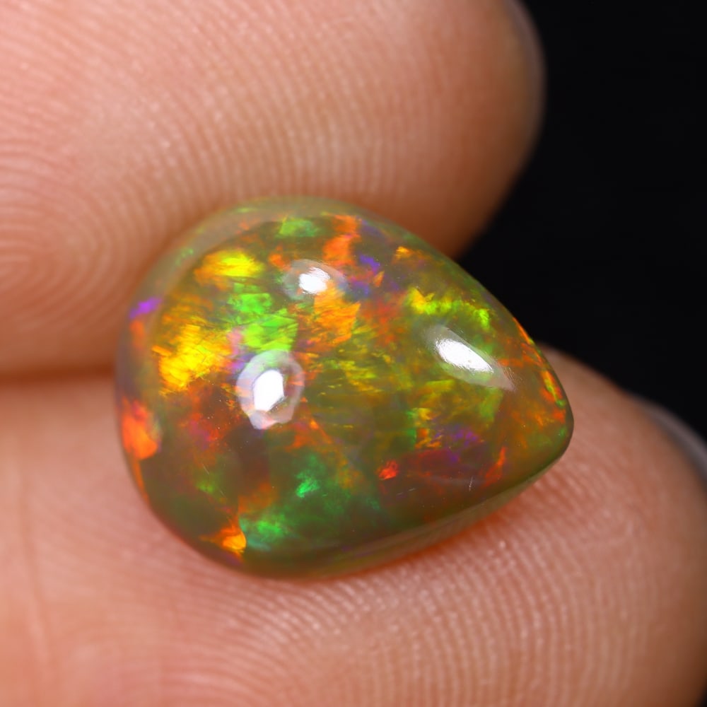 2.71Ct Natural Ethiopian Opal - 12.8x10.2x4.6 mm , 547C: Ksmith Heritage Auctioneers Subject: Natural Ethiopian Welo Opal Origin: Ethiopia Treatment: Unheated