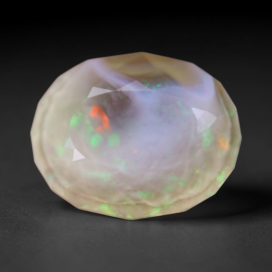 *6.28Ct Faceted Crystal Opal Polished - Ethiopian Opal , 749E: Ksmith Heritage Auctioneers Subject: Natural Ethiopian Crystal Opal Origin: Ethiopia Carat Weight: 6.28Ct Dimension: 16.1x13.1x6.8 mm Treatment: Natural Untreated Type: Fa
