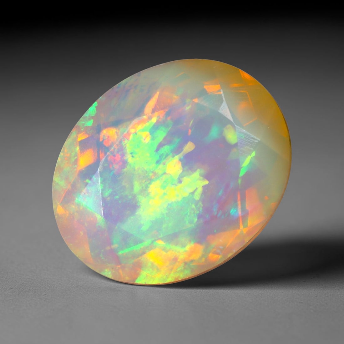 2.90Ct Natural Ethiopian Opal, Faceted Cut - 11.0x9.0x6.2 mm , 652C: Ksmith Heritage Auctioneers Subject: Natural Ethiopian Welo Opal Origin: Ethiopia Treatment: Unheated
