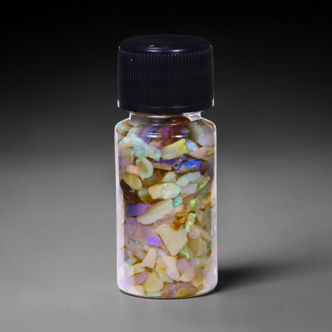 Australian Lightning Ridge Crystal Black Opal Rough Chip Jar (Good For Display), 979B: Ksmith Heritage Auctioneers Subject: Natural Australian Opal Origin: Australia Quantity: 1 Jar as photo