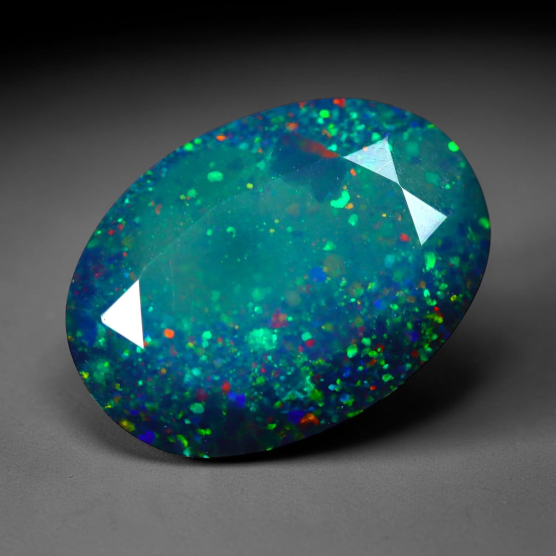2.12Ct Natural Smoked Ethiopian Black Opal, Faceted Cut - 10.7x7.7x5.6 mm , 702C: Ksmith Heritage Auctioneers Subject: Natural Ethiopian Welo Opal Origin: Ethiopia Treatment: Smoked