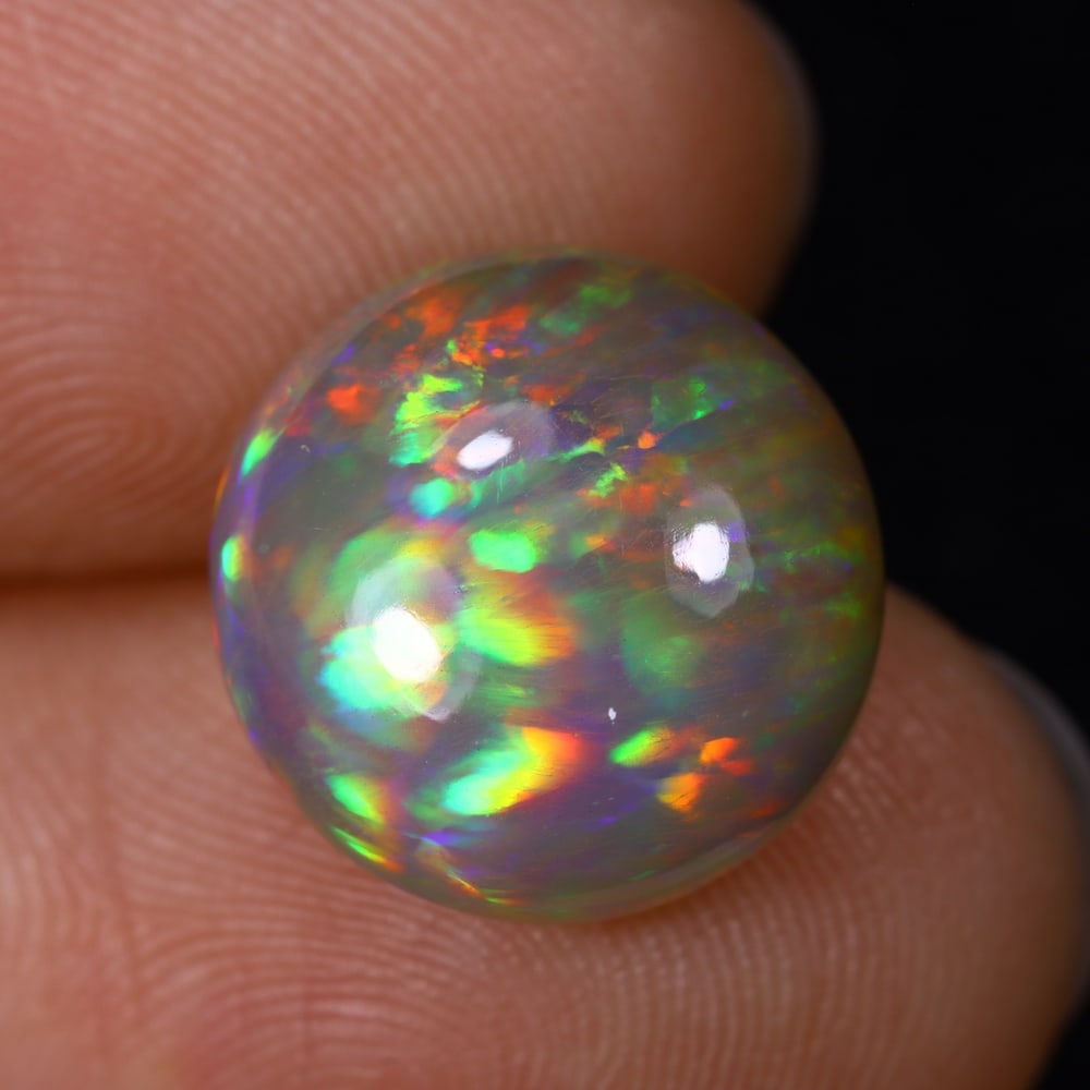 5.14Ct Natural Ethiopian Opal - 12.8x12.8x6.5 mm , 549C: Ksmith Heritage Auctioneers Subject: Natural Ethiopian Welo Opal Origin: Ethiopia Treatment: Unheated