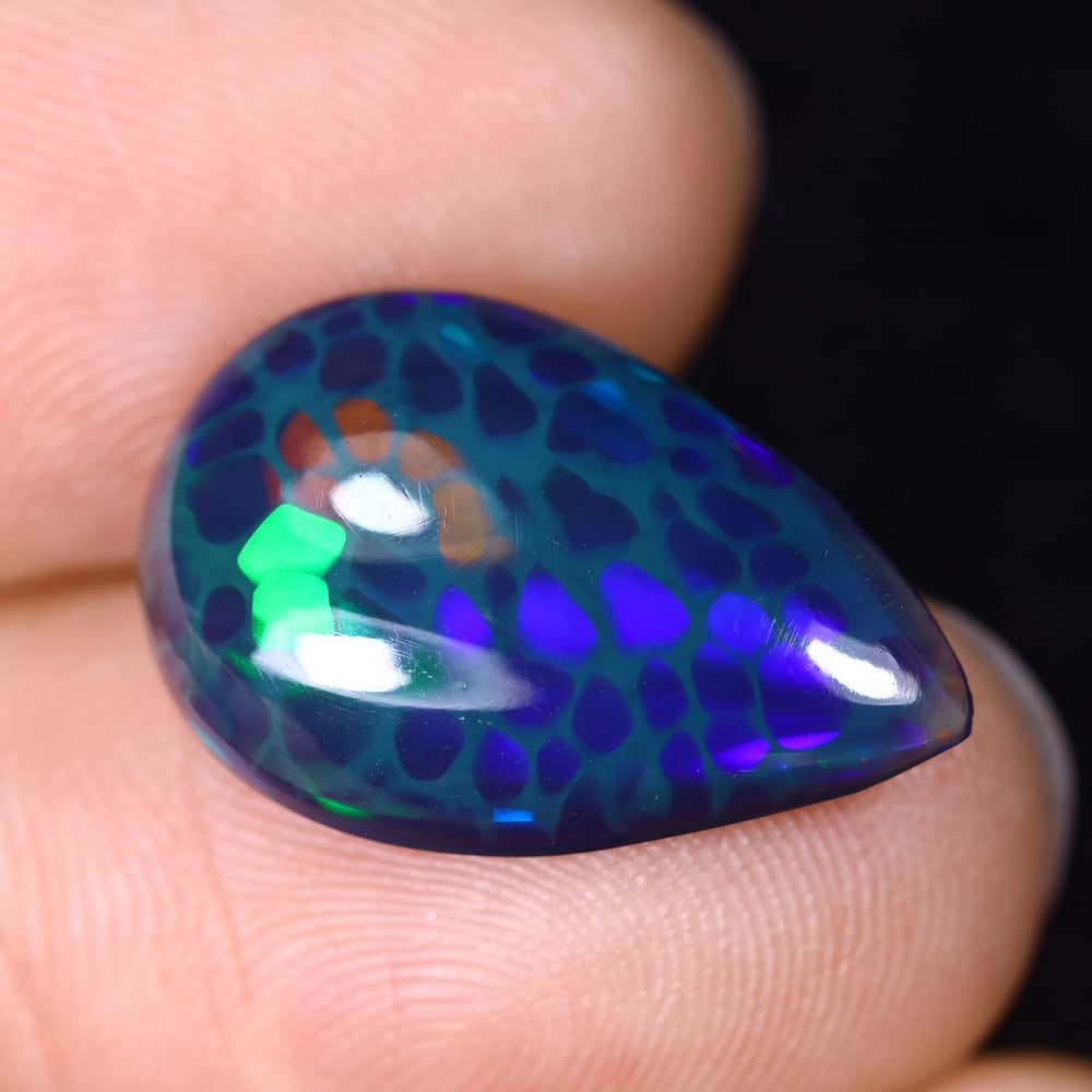4.49Ct Natural Ethiopian Black Opal - 18.6x12.2x4.7 mm , 579C: Ksmith Heritage Auctioneers Subject: Natural Ethiopian Welo Opal Origin: Ethiopia Treatment: Smoked