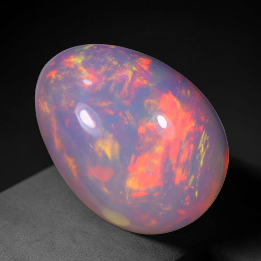 *12.12Ct Welo Opal Polished - Ethiopian Opal , 277E: Ksmith Heritage Auctioneers Subject: Natural Ethiopian Welo Opal Origin: Ethiopia Carat Weight: 12.12Ct Dimension: 18.5x13.7x9.2 mm Treatment: Natural Untreated Type: Cabo