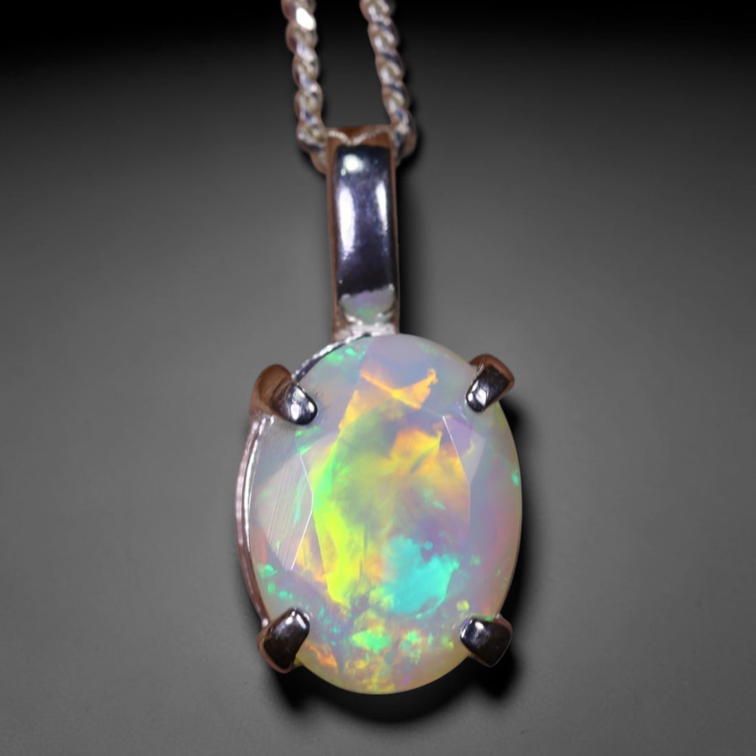1.74g Natural Opal Stone Sterling Silver 925 Necklace (Pendant with Chain) , 1183E: Ksmith Heritage Auctioneers Subject: Natural Ethiopian Opal Necklace Origin: Ethiopia Pendant Dimension : 18x6mm (included clasp) Stone Dimension: 11x8mm Treatment: Natural Untrea