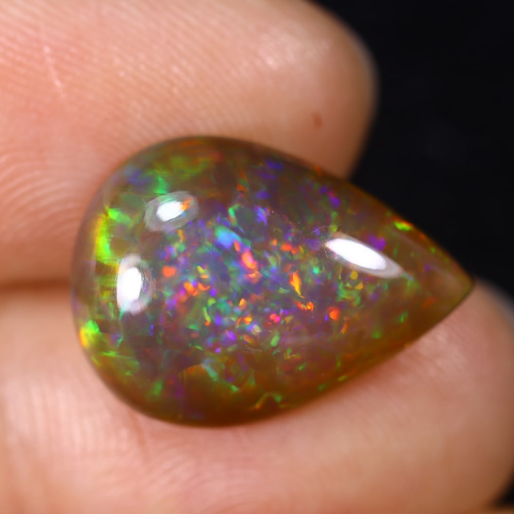 6.06Ct Natural Ethiopian Opal - 17.6x12.8x5.5 mm , 564C: Ksmith Heritage Auctioneers Subject: Natural Ethiopian Welo Opal Origin: Ethiopia Treatment: Unheated