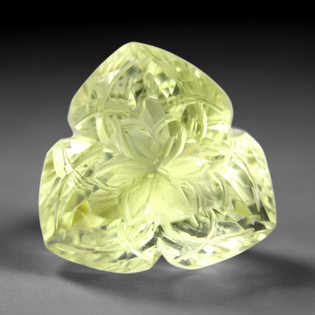 51.50Ct Lemon Carving Quartz - Polished Carving , 32E: Ksmith Heritage Auctioneers Subject: Natural Lemon Quartz Origin: Brazil Carat Weight: 51.50Ct Dimension: 25.2x24.5x16.4 mm Treatment: Untreated Type: Carving, Polished