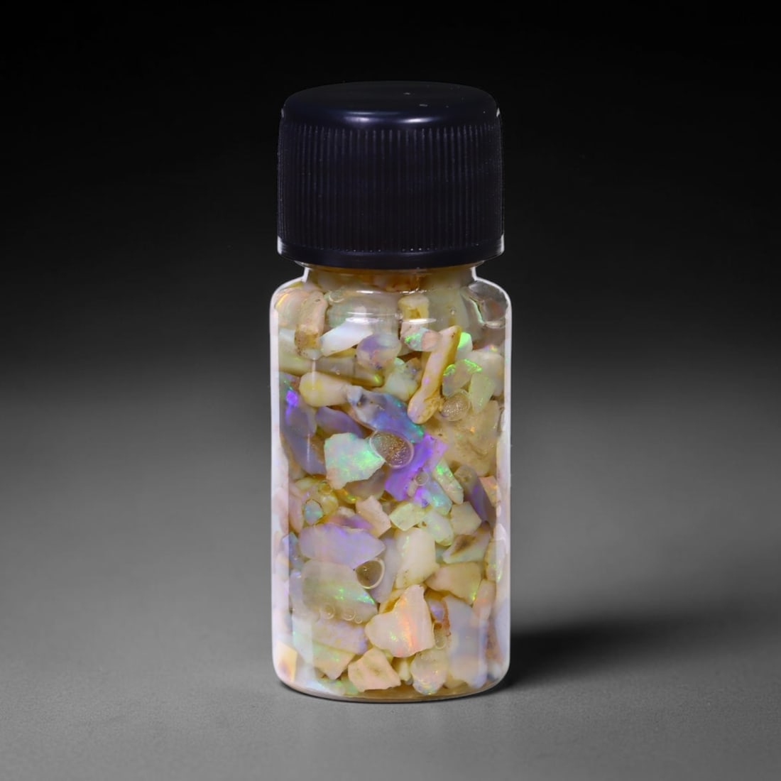 Australian Lightning Ridge Crystal Black Opal Rough Chip Jar (Good For Display), 990B: Ksmith Heritage Auctioneers Subject: Natural Australian Opal Origin: Australia Quantity: 1 Jar as photo