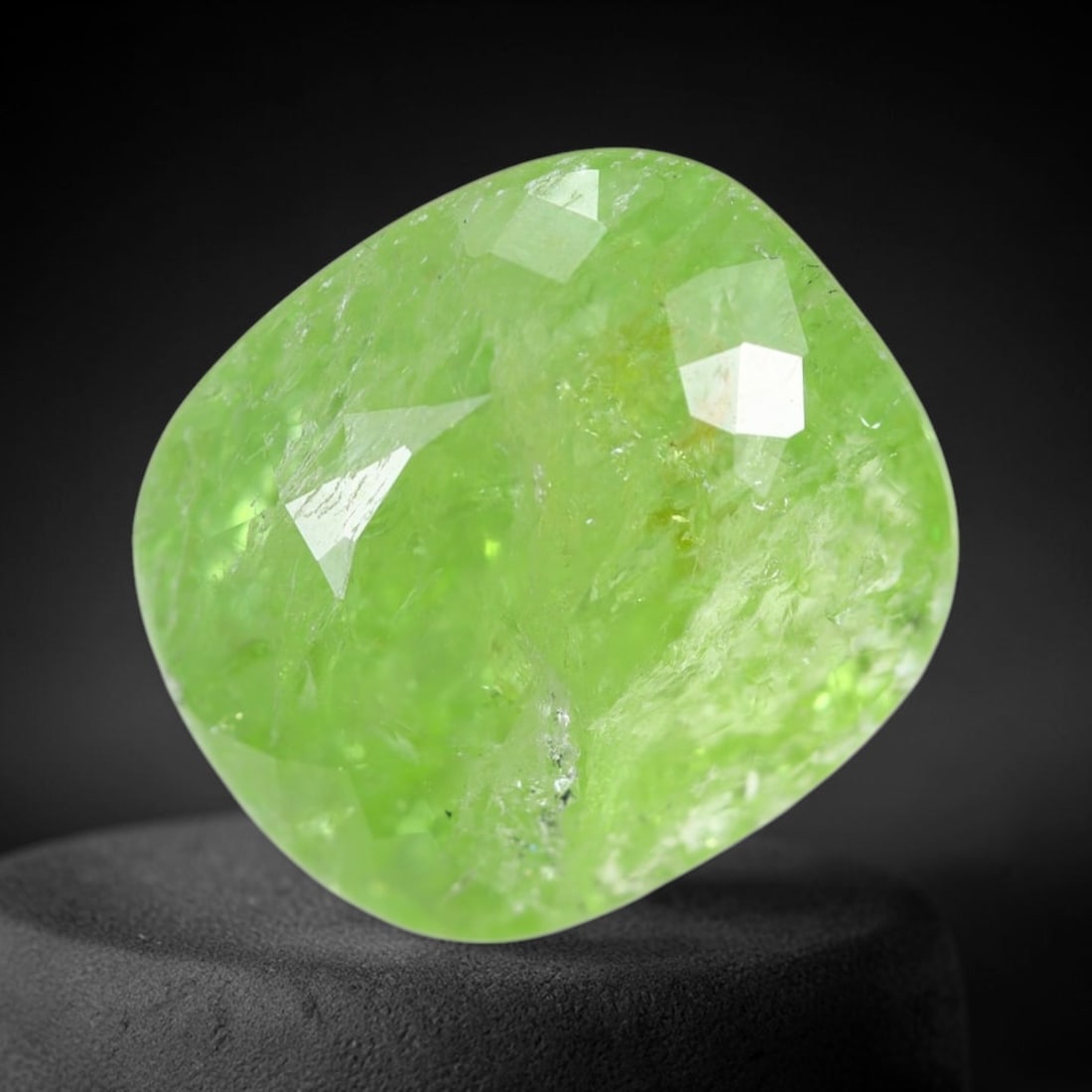 12.96Ct Grossular Garnet - Polished Faceted , 271E: Ksmith Heritage Auctioneers Subject: Natural Garnet Origin: India Carat Weight: 12.96Ct Dimension: 14.9x13.2x8.9 mm Type: Faceted, Polished