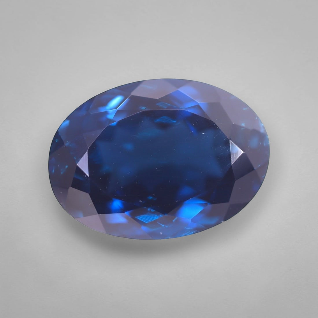 *17.04Ct London Blue Topaz - Polished Faceted , 212C: Ksmith Heritage Auctioneers Subject: Natural Blue Topaz Origin: Myanmar Carat Weight: 17.04Ct Dimension: 18x13x9.1 mm Treatment: Irridiated Type: Faceted, Polished
