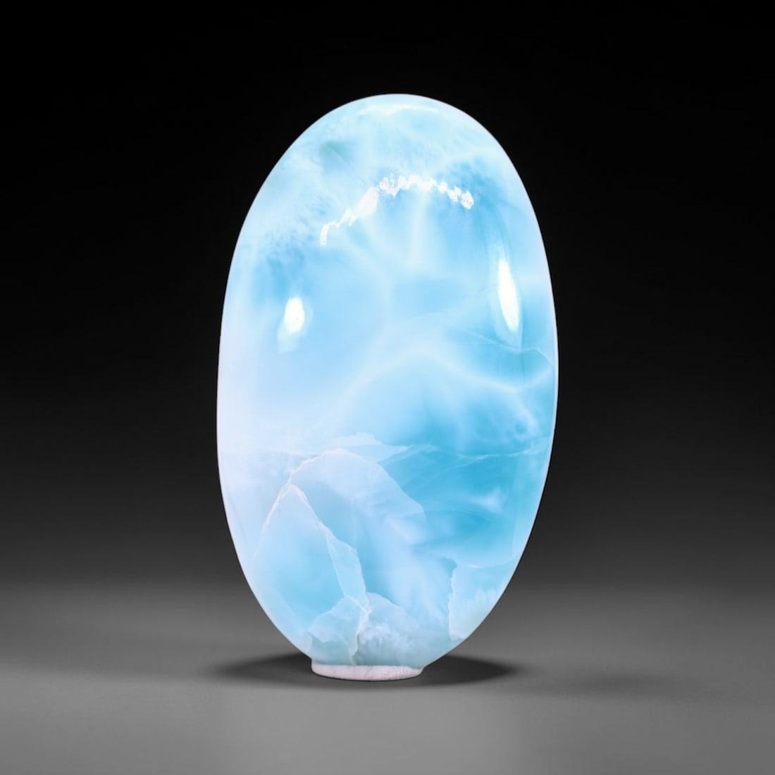 *58.86Ct Natural Larimar - Polished Cabochon , 249C: Ksmith Heritage Auctioneers Subject: Natural Larimar Carat Weight: 58.86 Ct Dimension: 38.9x22.9x7.5 mm Type: Cabochon, Polished
