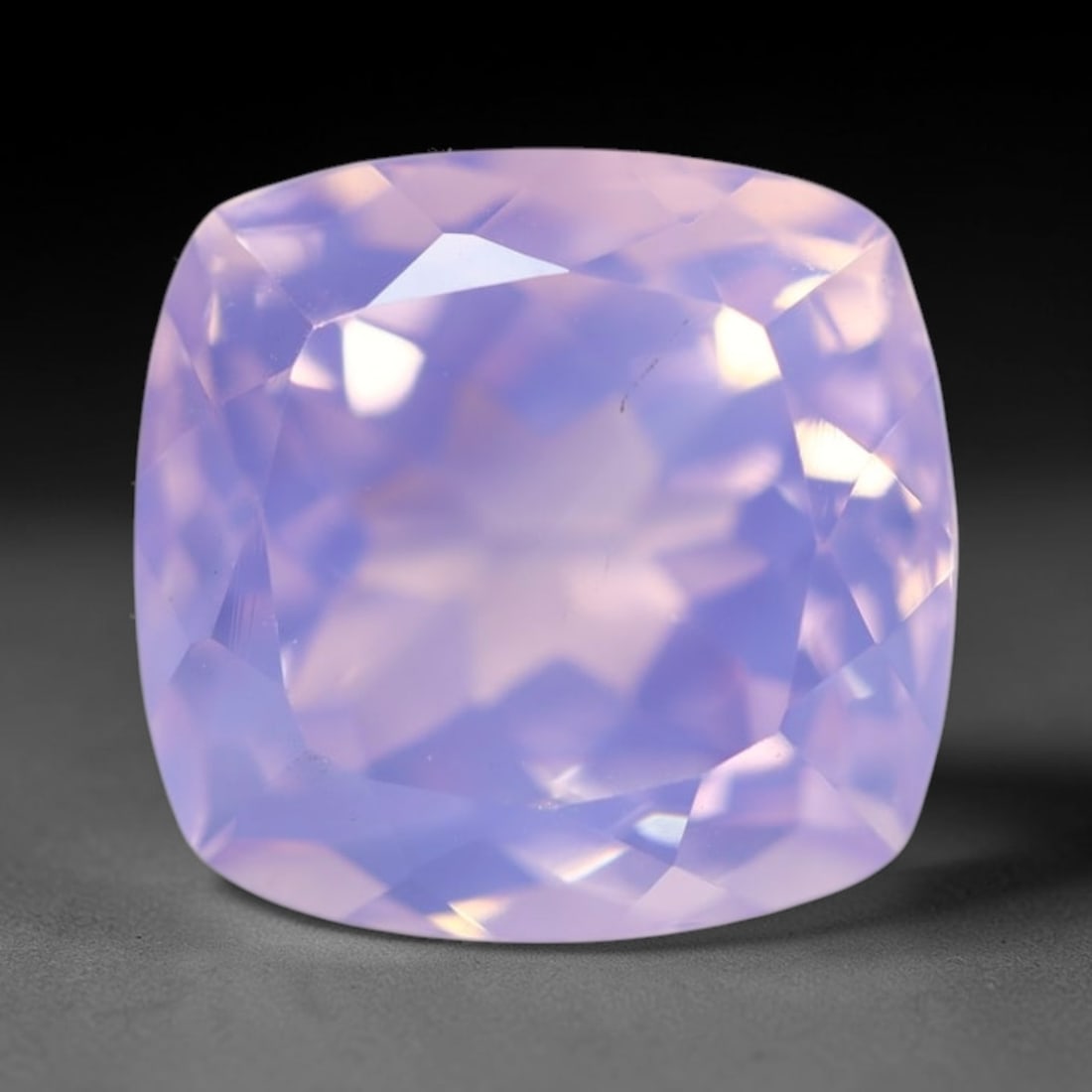 9.11Ct Lavender Amethyst - Polished Faceted , 965E: Ksmith Heritage Auctioneers Subject: Natural Lavender Amethyst Origin: Brazil Carat Weight: 9.11Ct Dimension: 12.6x12.1x9.3 mm Treatment: Untreated Type: Faceted, Polished