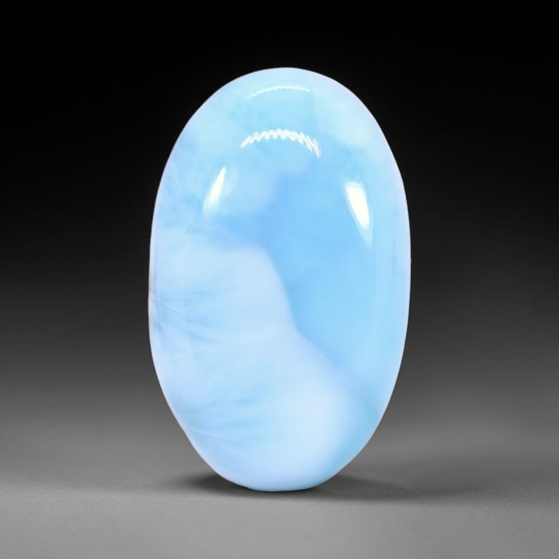 *15.61Ct Natural Larimar - Polished Cabochon , 244C: Ksmith Heritage Auctioneers Subject: Natural Larimar Carat Weight: 15.61 Ct Dimension: 21.7x13.3x5.6 mm Type: Cabochon, Polished