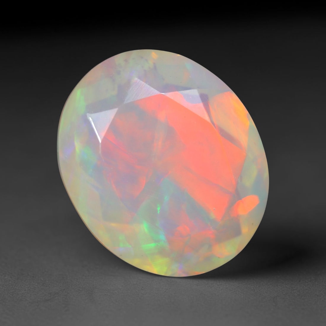 3.21Ct Natural Ethiopian Opal, Faceted Cut - 12.1x10.1x6.4 mm , 679C: Ksmith Heritage Auctioneers Subject: Natural Ethiopian Welo Opal Origin: Ethiopia Treatment: Unheated