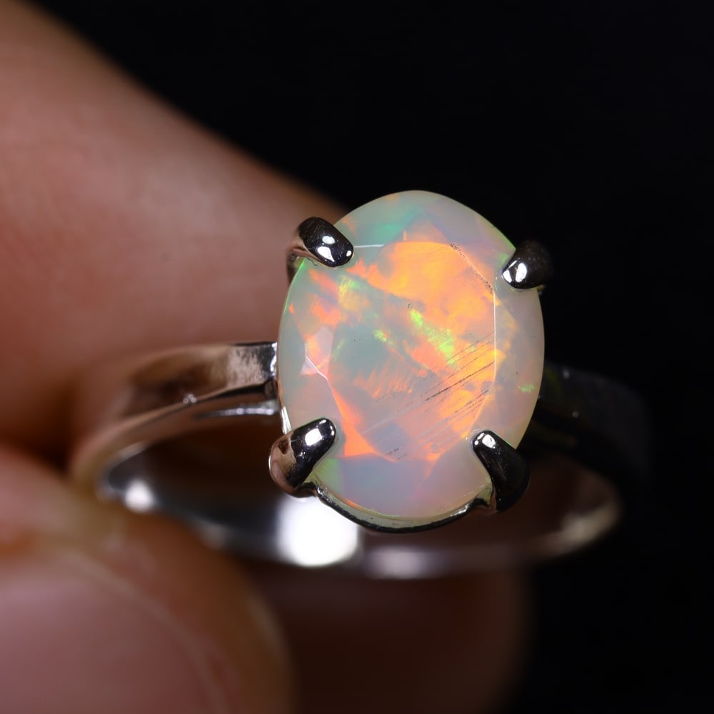 3.18g Natural Opal Stone Sterling Silver 925 Ring (Adjustable) , 601E: Ksmith Heritage Auctioneers Subject: Natural Ethiopian Opal Ring (Silver 925) Origin: Ethiopia Stone Dimension: 11x8mm Treatment: Natural Untreated Type: Faceted, Polished