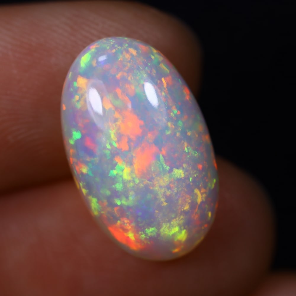 *7.38Ct Welo Opal Polished - Ethiopian Opal , 418C: Ksmith Heritage Auctioneers Subject: Natural Ethiopian Welo Opal Origin: Ethiopia Carat Weight: 7.38Ct Dimension: 18.1x11.1x7.2 mm Treatment: Natural Untreated Type: Caboc