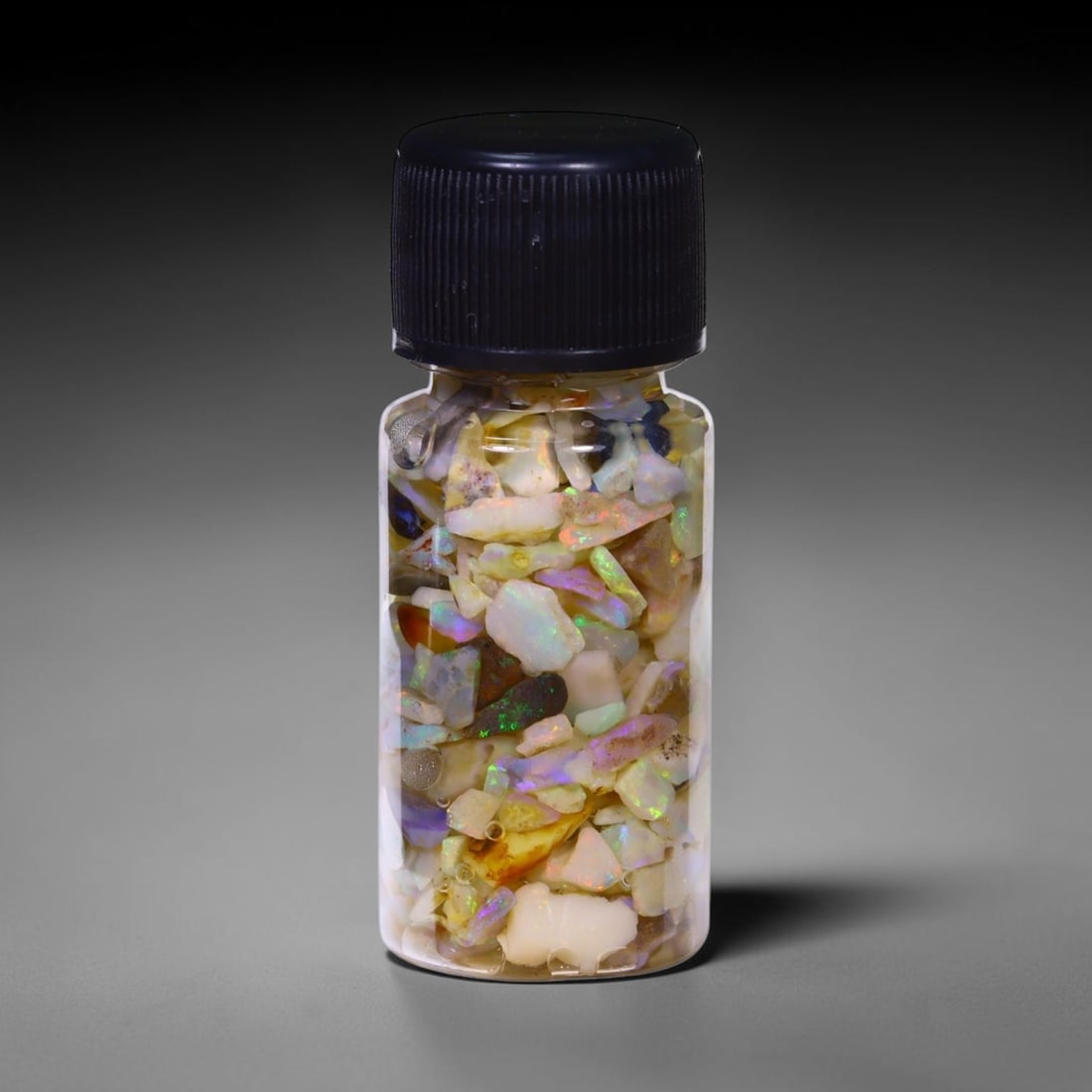 Australian Lightning Ridge Crystal Black Opal Rough Chip Jar (Good For Display), 168B: Ksmith Heritage Auctioneers Subject: Natural Australian Opal Origin: Australia Quantity: 1 Jar as photo
