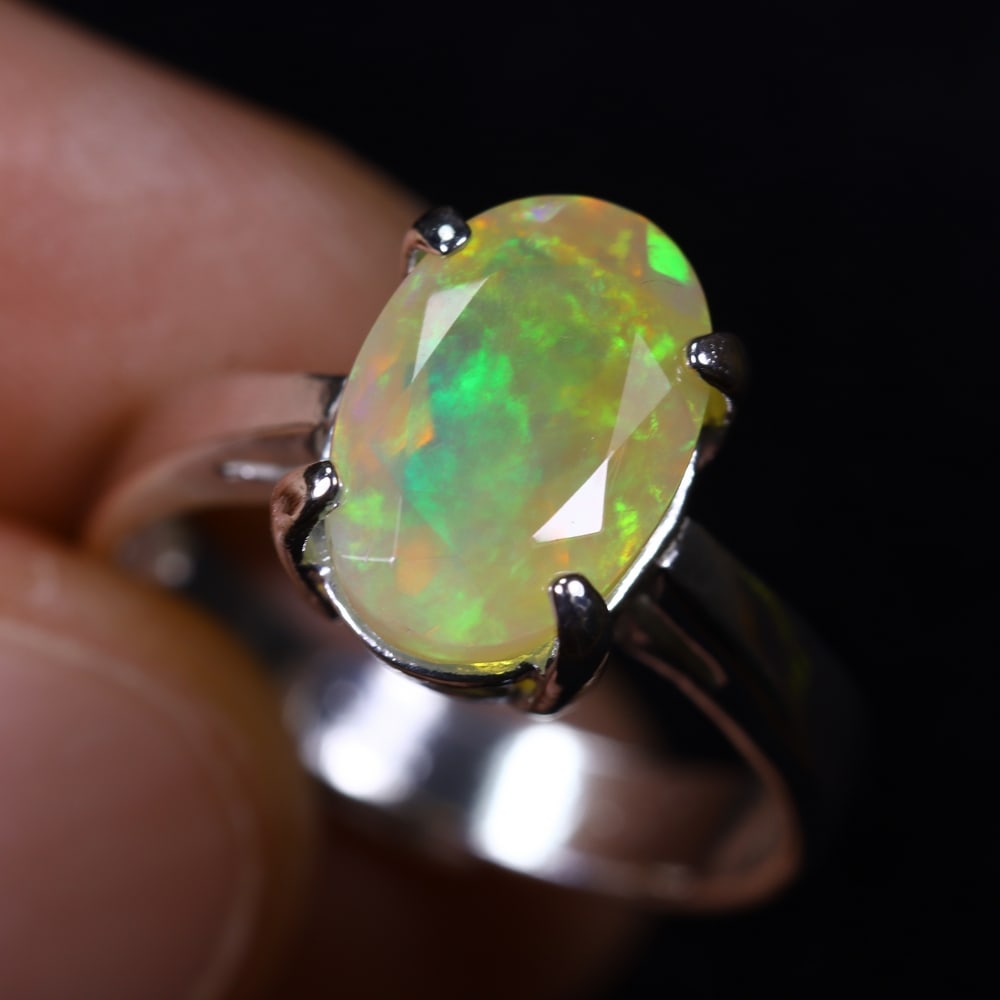 3.30g Natural Opal Stone Sterling Silver 925 Ring (Adjustable) , 316E: Ksmith Heritage Auctioneers Subject: Natural Ethiopian Opal Ring (Silver 925) Origin: Ethiopia Stone Dimension: 11x8mm Treatment: Natural Untreated Type: Faceted, Polished