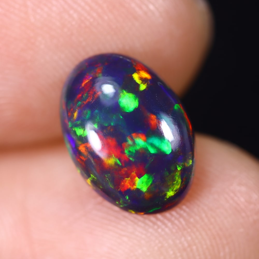 1.80Ct Natural Ethiopian Black Opal - 11.9x8.5x3.6 mm , 610C: Ksmith Heritage Auctioneers Subject: Natural Ethiopian Welo Opal Origin: Ethiopia Treatment: Smoked