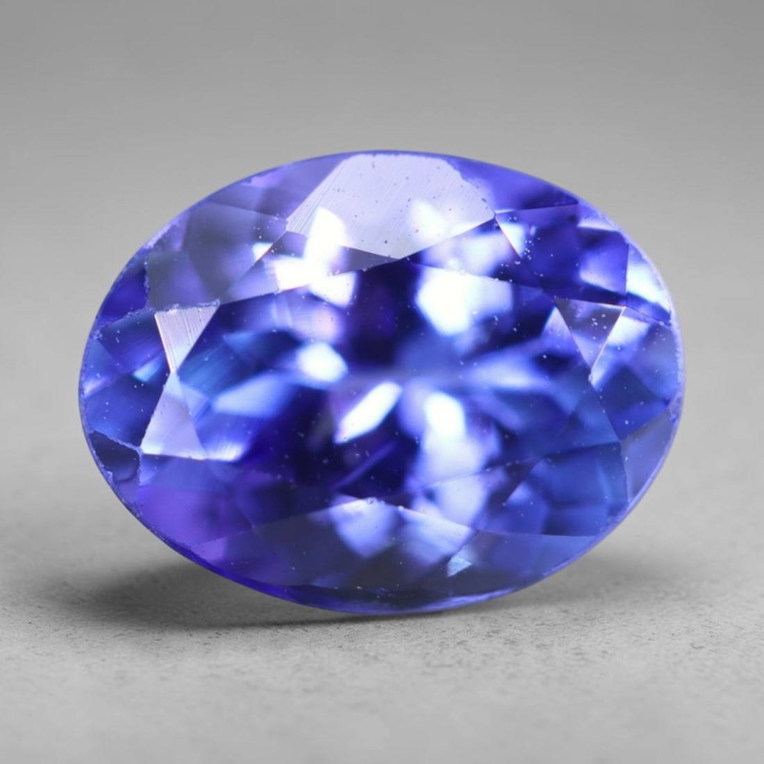 1.78Ct Tanzanite Faceted - Oval Polished , 103B: Ksmith Heritage Auctioneers Subject: Natural Tanzanite Origin: Tanzania Dimension: 8.5x6.5x4.7 mm Treatment: Heated Shape: Oval Type: Faceted, Polished