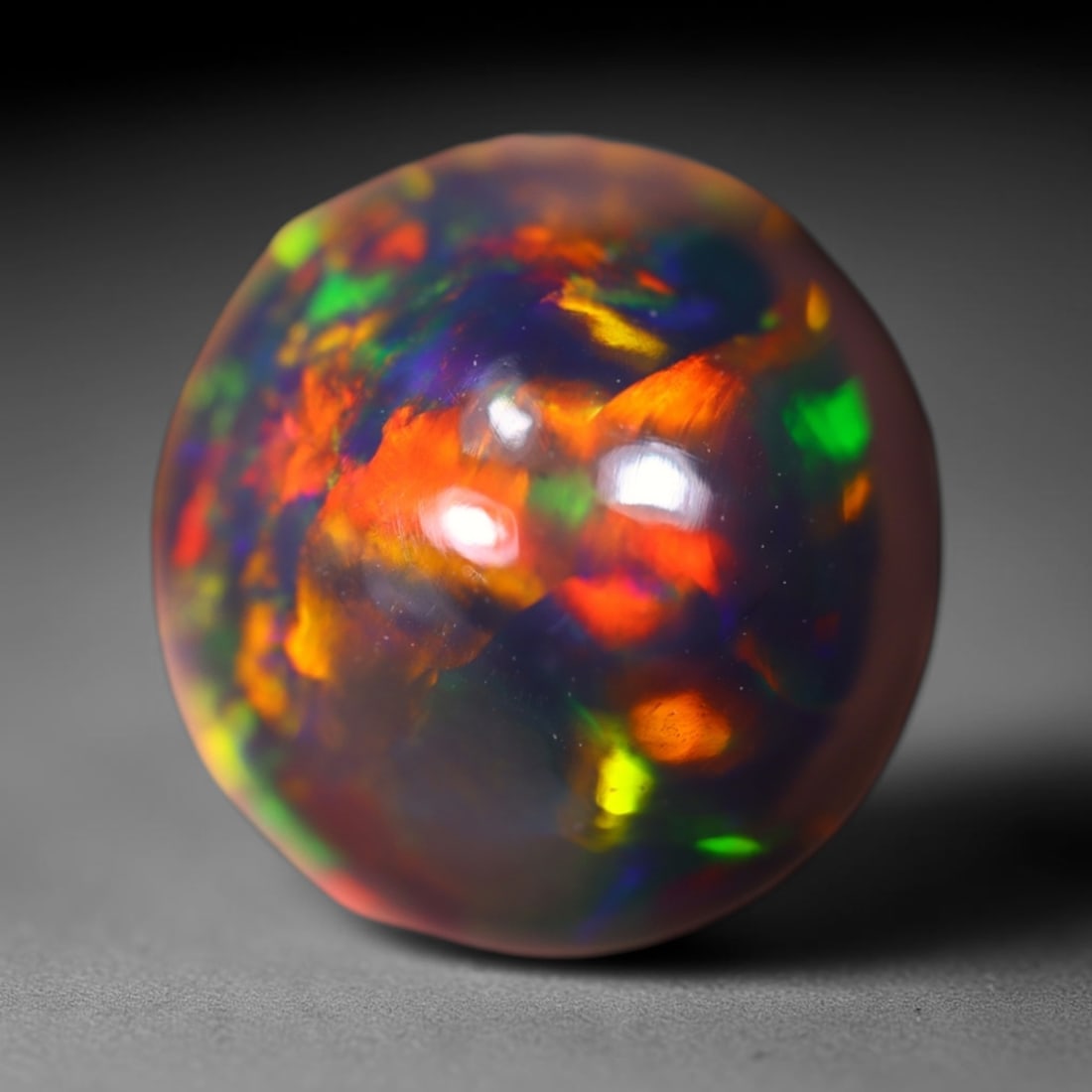 *2.86Ct Welo Black Opal Polished - Ethiopian Opal , 760E: Ksmith Heritage Auctioneers Subject: Natural Ethiopian Welo Black Opal Origin: Ethiopia Carat Weight: 2.86Ct Dimension: 9.9x9.7x6.7 mm Treatment: Smoked Type: Cabochon, Po
