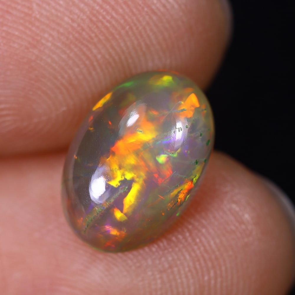 2.25Ct Natural Ethiopian Opal - 12.0x8.3x4.4 mm , 561C: Ksmith Heritage Auctioneers Subject: Natural Ethiopian Welo Opal Origin: Ethiopia Treatment: Unheated