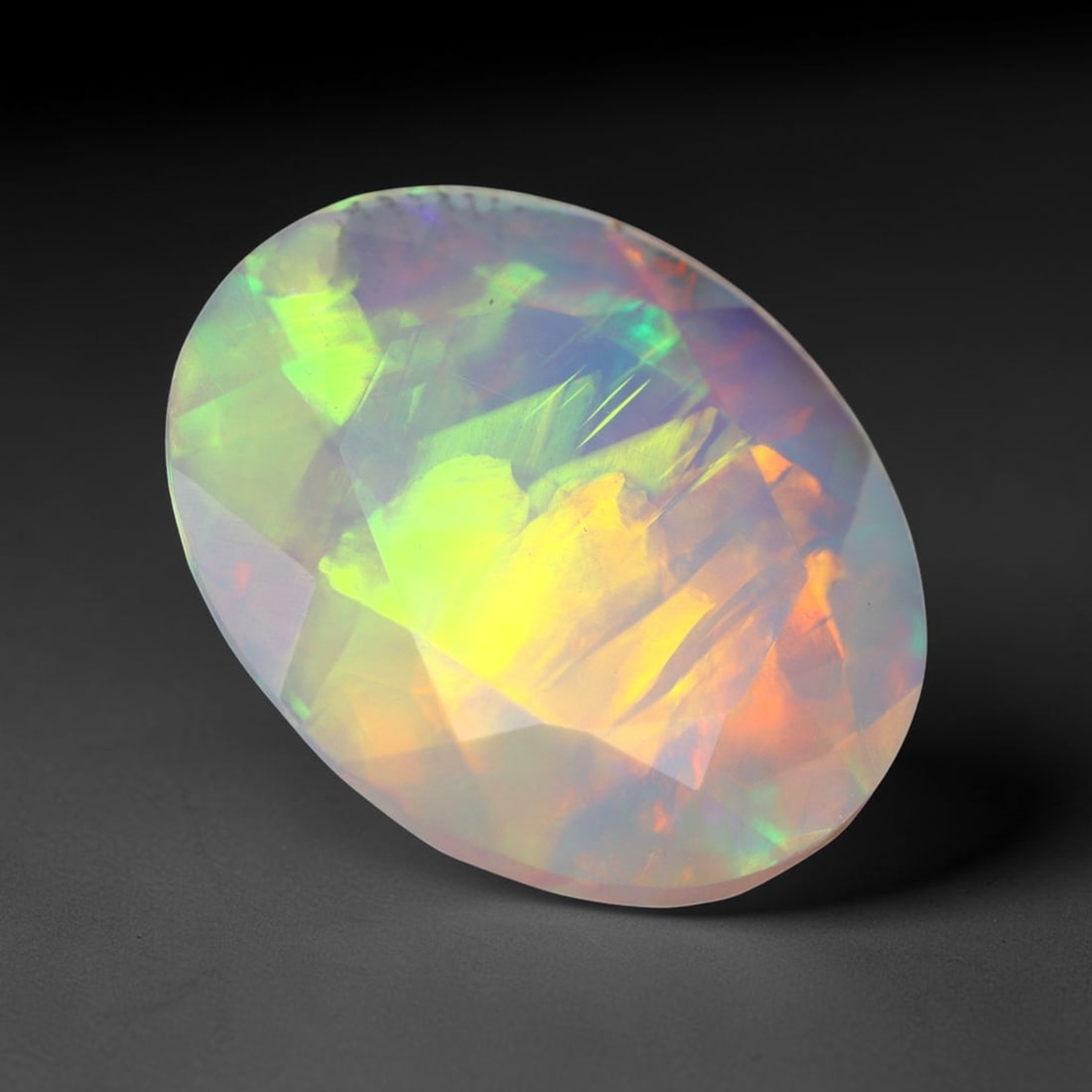 2.50Ct Natural Ethiopian Opal, Faceted Cut - 11.9x9.8x5.4 mm , 660C: Ksmith Heritage Auctioneers Subject: Natural Ethiopian Welo Opal Origin: Ethiopia Treatment: Unheated