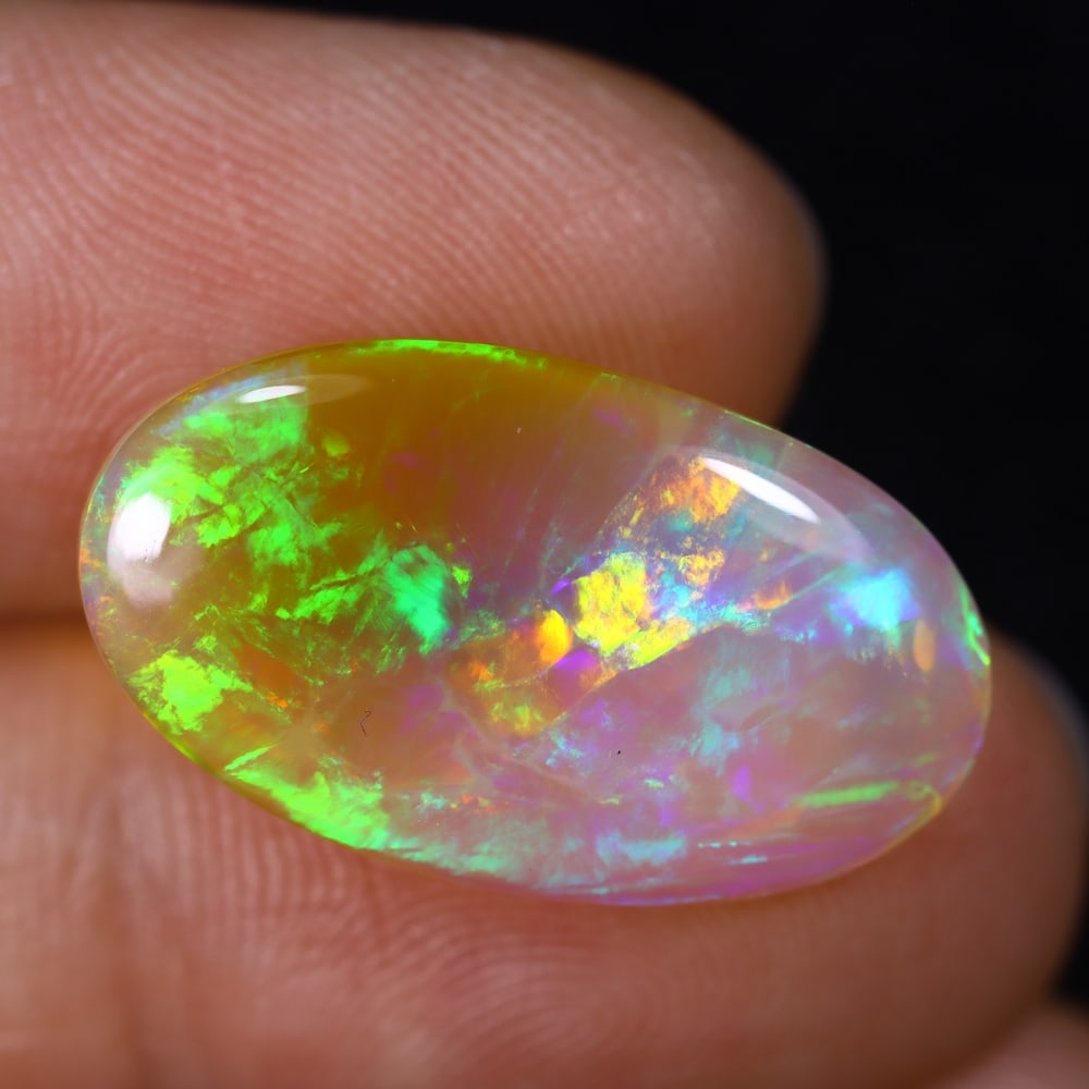 9.64Ct Natural Ethiopian Opal - 22.0x12.8x5.7 mm , 555C: Ksmith Heritage Auctioneers Subject: Natural Ethiopian Welo Opal Origin: Ethiopia Treatment: Unheated