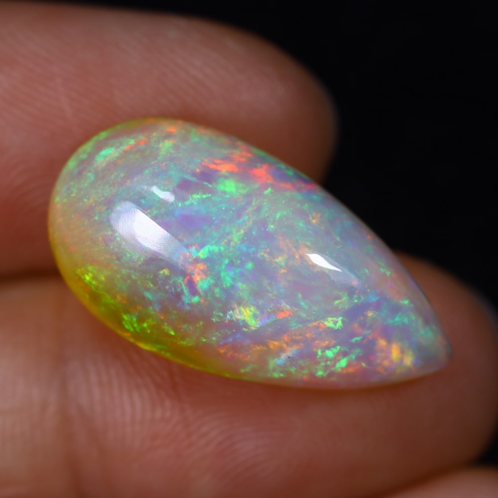 10.24Ct Natural Ethiopian Opal - 22.7x12.0x7.5 mm , 557C: Ksmith Heritage Auctioneers Subject: Natural Ethiopian Welo Opal Origin: Ethiopia Treatment: Unheated