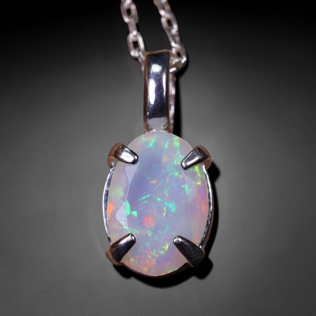 1.58g Natural Opal Stone Sterling Silver 925 Necklace (Pendant with Chain) , 29E: Ksmith Heritage Auctioneers Subject: Natural Ethiopian Opal Necklace Origin: Ethiopia Pendant Dimension : 18x6mm (included clasp) Stone Dimension: 11x8mm Treatment: Natural Untrea