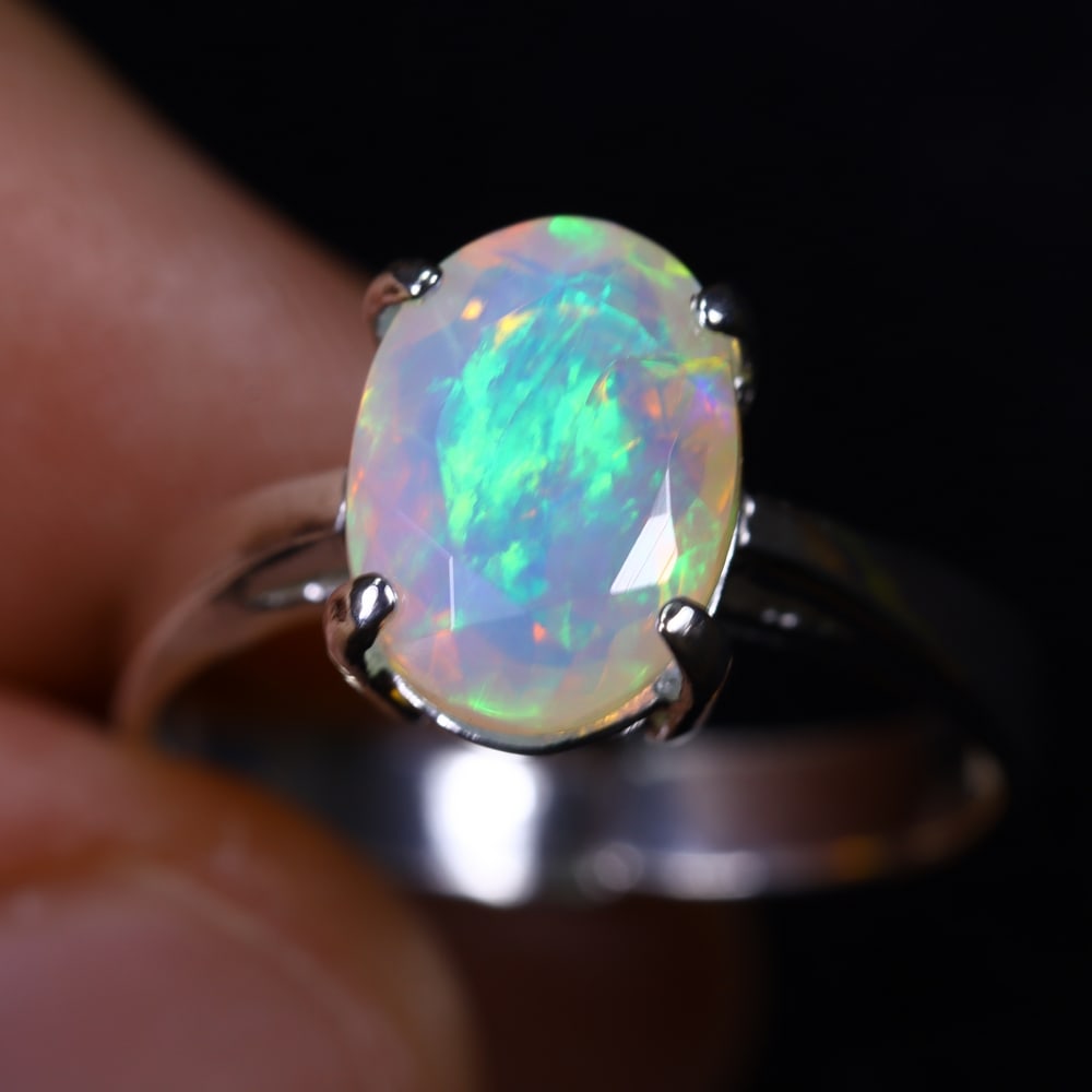 2.93g Natural Opal Stone Sterling Silver 925 Ring (Adjustable) , 540E: Ksmith Heritage Auctioneers Subject: Natural Ethiopian Opal Ring (Silver 925) Origin: Ethiopia Stone Dimension: 11x8mm Treatment: Natural Untreated Type: Faceted, Polished