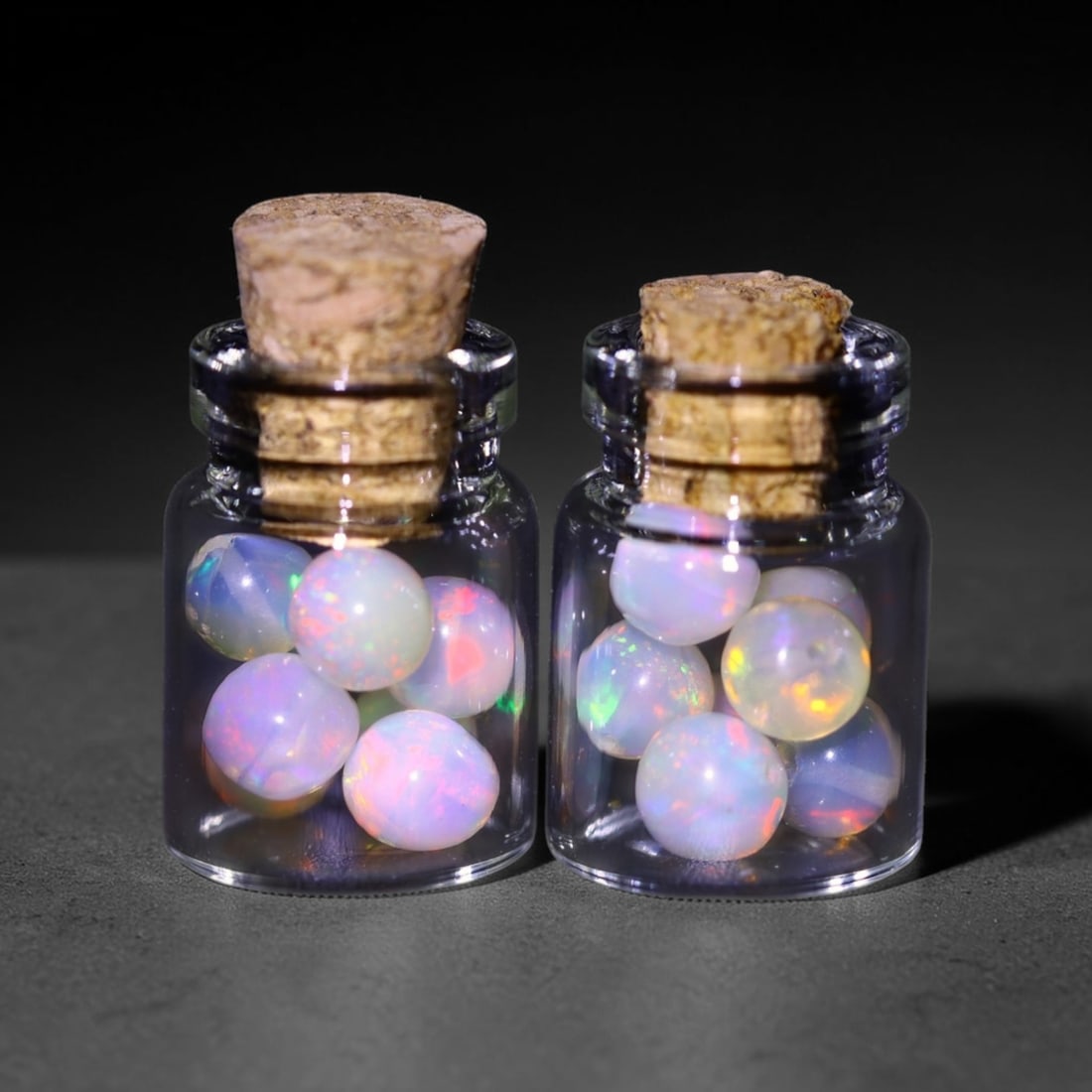 Twin Pack - 4.5mm Ethiopian Opal Ball in Display Jar - Bottle Size 1.5cm , 83C: Ksmith Heritage AuctioneersSubject: Natural Opal (with bottle) Origin: Ethiopia Treatment: Unheated