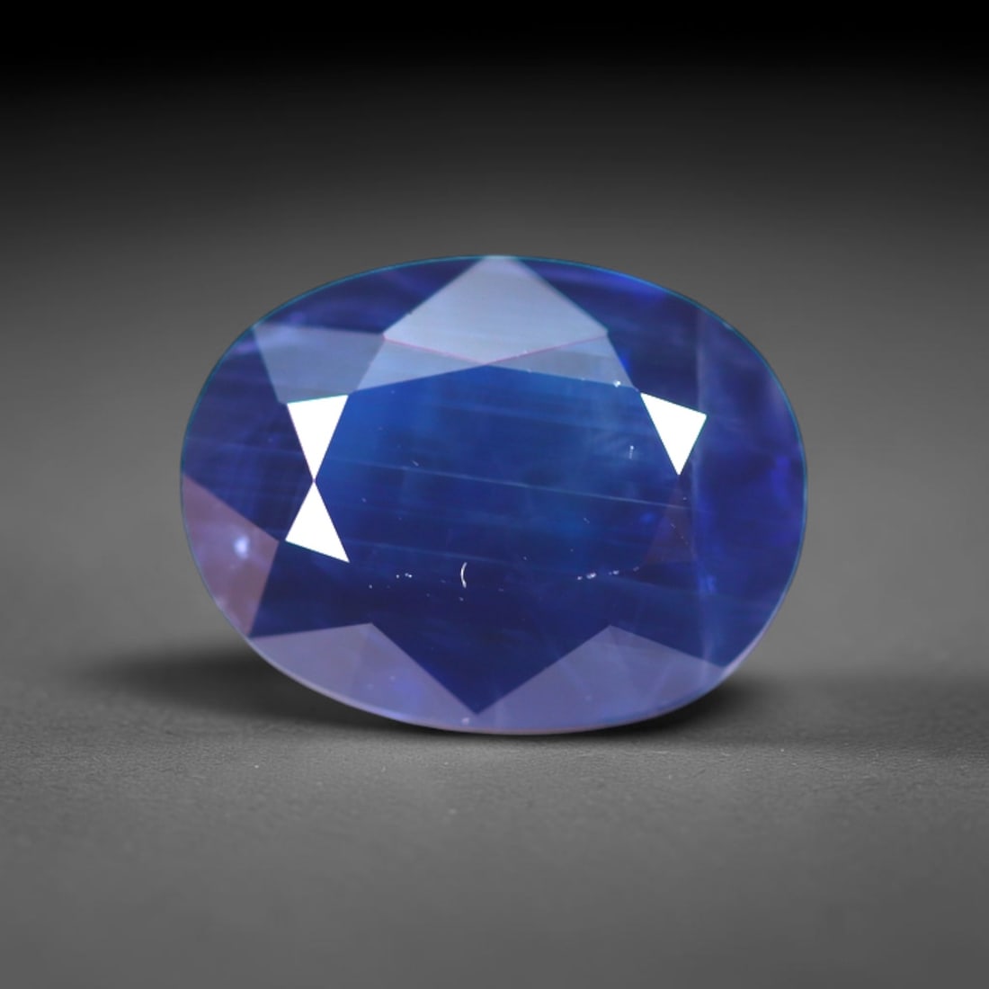 *1.90Ct Heated Blue Sapphire - Polished Faceted , 324C: Ksmith Heritage Auctioneers Subject: Natural Sapphire Carat Weight: 1.90Ct Dimension: 8.6x6.5x3.6 mm Treatment: Heated Type: Faceted, Polished