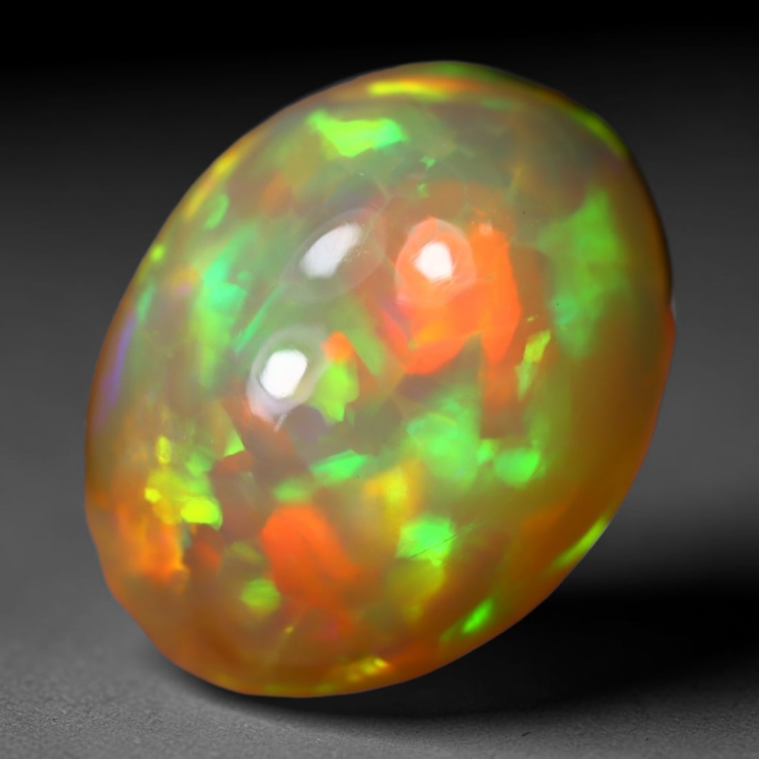 4.35Ct Welo Opal Polished - Ethiopian Opal, 1212B: Ksmith Heritage Auctioneers Subject: Natural Ethiopian Welo Opal Origin: Ethiopia Carat Weight: 4.35Ct Dimension: 12.7x10x7.2 mm Treatment: Natural Untreated Type: Cabochon, Po