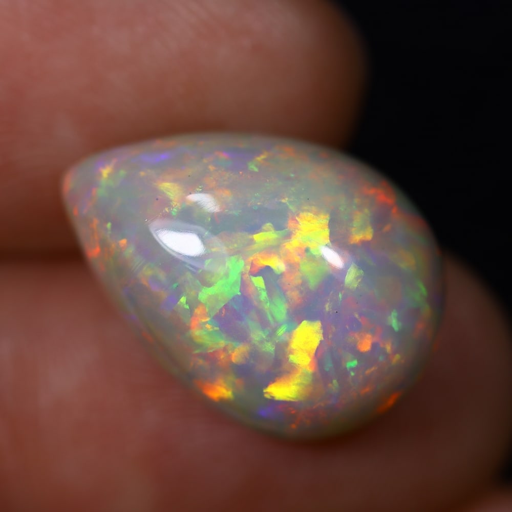 *7.22Ct Welo Opal Polished - Ethiopian Opal , 412C: Ksmith Heritage Auctioneers Subject: Natural Ethiopian Welo Opal Origin: Ethiopia Carat Weight: 7.22Ct Dimension: 17.5x12.5x7.8 mm Treatment: Natural Untreated Type: Caboc