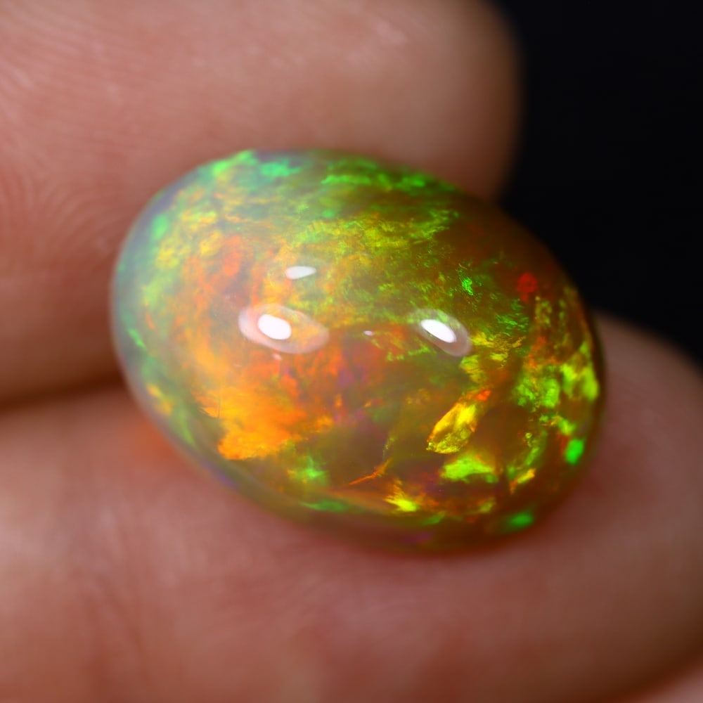 *9.40Ct Welo Opal Polished - Ethiopian Opal , 421C: Ksmith Heritage Auctioneers Subject: Natural Ethiopian Welo Opal Origin: Ethiopia Carat Weight: 9.40Ct Dimension: 17.5x12.8x8.7 mm Treatment: Natural Untreated Type: Caboc