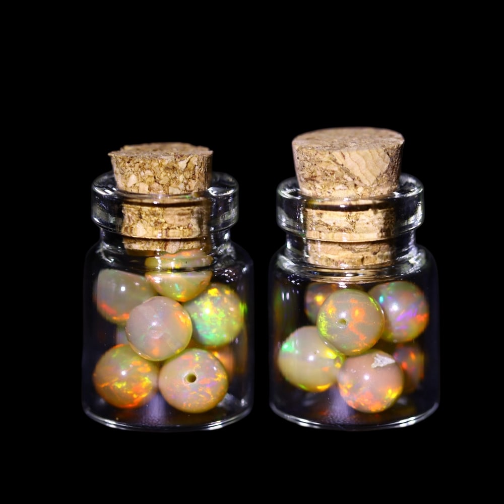 Twin Pack - 4.5mm Ethiopian Opal Ball in Display Jar - Bottle Size 1.5cm , 87C: Ksmith Heritage AuctioneersSubject: Natural Opal (with bottle) Origin: Ethiopia Treatment: Unheated