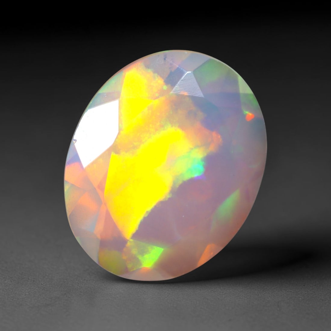 1.98Ct Natural Ethiopian Opal, Faceted Cut - 11.9x9.9x4.5 mm , 668C: Ksmith Heritage Auctioneers Subject: Natural Ethiopian Welo Opal Origin: Ethiopia Treatment: Unheated