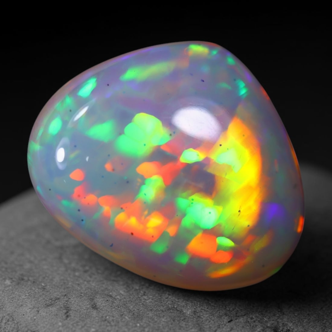 *7.95Ct Welo Opal Polished - Ethiopian Opal , 1148E: Ksmith Heritage Auctioneers Subject: Natural Ethiopian Welo Opal Origin: Ethiopia Carat Weight: 7.95Ct Dimension: 16.8x14.1x7.2 mm Treatment: Natural Untreated Type: Caboc
