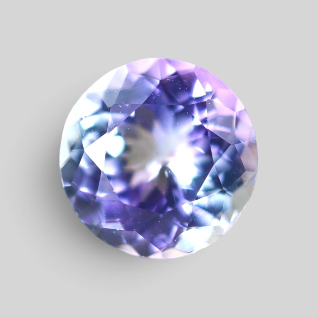 1.70Ct Tanzanite - Polished Faceted - Round Faceted , 313E: Ksmith Heritage Auctioneers Subject: Natural Tanzanite Origin: Tanzania Carat Weight: 1.70Ct Dimension: 7.4 x 7.4 x 4.4 mm Treatment: Heated Shape: Round Type: F