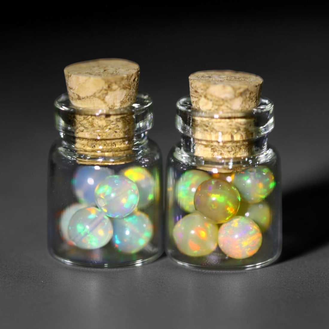 Twin Pack - 4.5mm Ethiopian Opal Ball in Display Jar - Bottle Size 1.5cm , 77C: Ksmith Heritage AuctioneersSubject: Natural Opal (with bottle) Origin: Ethiopia Treatment: Unheated