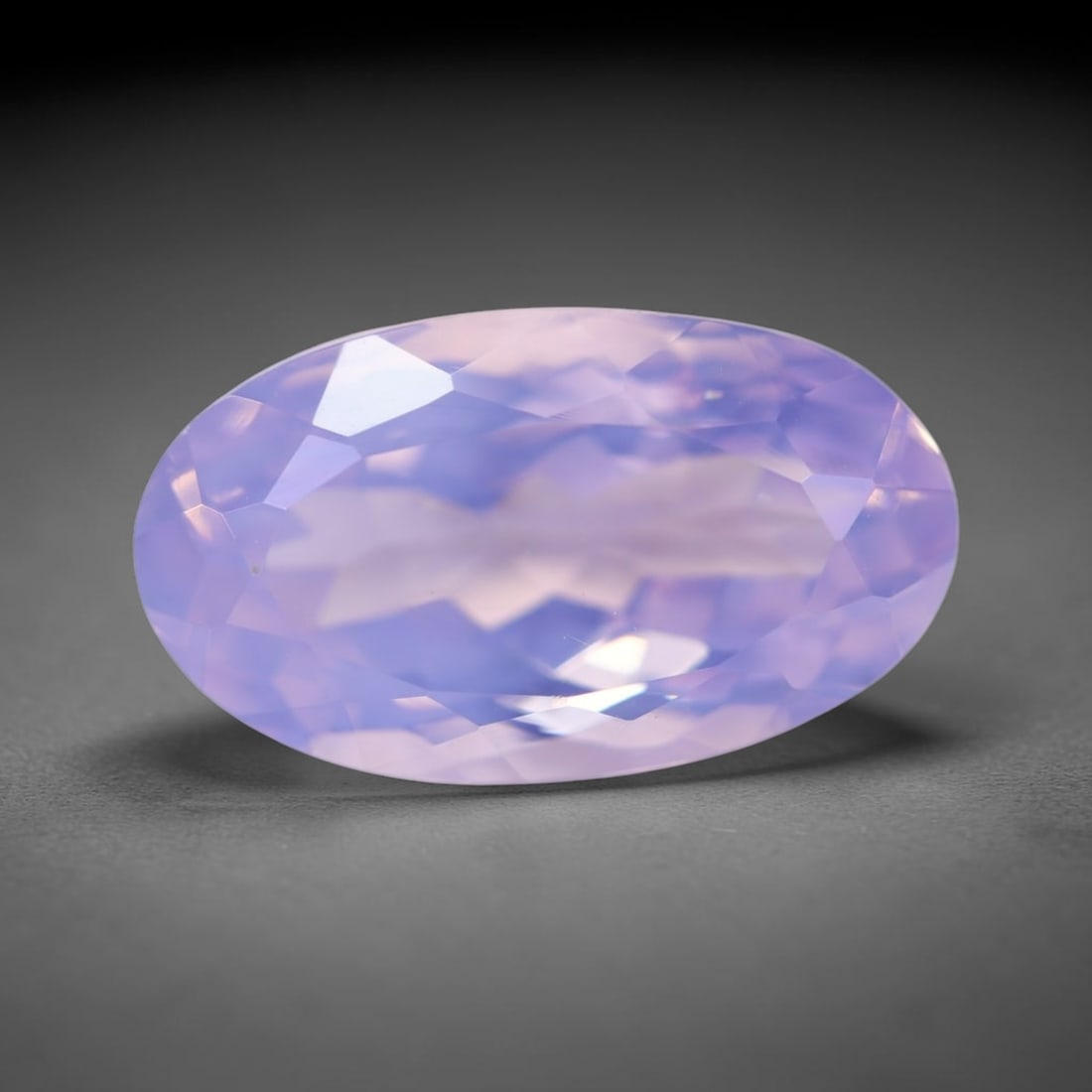 9.14Ct Lavender Amethyst - Polished Faceted , 310E: Ksmith Heritage Auctioneers Subject: Natural Lavender Amethyst Origin: Brazil Carat Weight: 9.14Ct Dimension: 17.7x10.2x8.5 mm Treatment: Untreated Type: Faceted, Polished