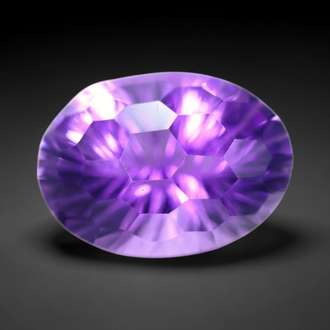 11.22Ct Purple Amethyst - Polished Faceted , 688E: Ksmith Heritage Auctioneers Subject: Natural Amethyst Origin: Brazil Carat Weight: 11.22Ct Dimension: 17.2x12.5x10 mm Treatment: Untreated Type: Faceted, Polished